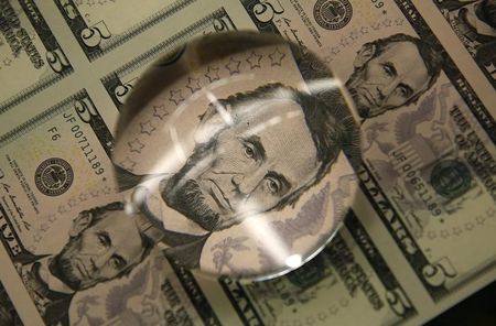 Dollar forecast to stabilize amid mixed economic
signals
