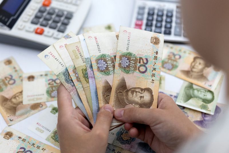 China’s yuan slips to 2-year low versus peers after Trump-Xi
call leaves issues unresolved