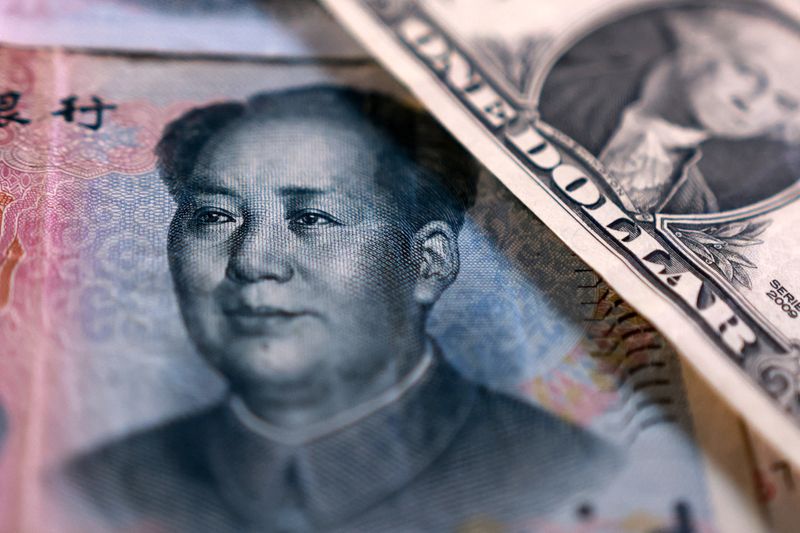 Exclusive-China state-owned banks soak up dollars to slow
yuan gains, sources say